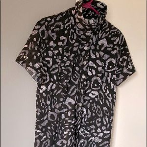 Street wear dress/tunic top. Pops with boots, heels or flat